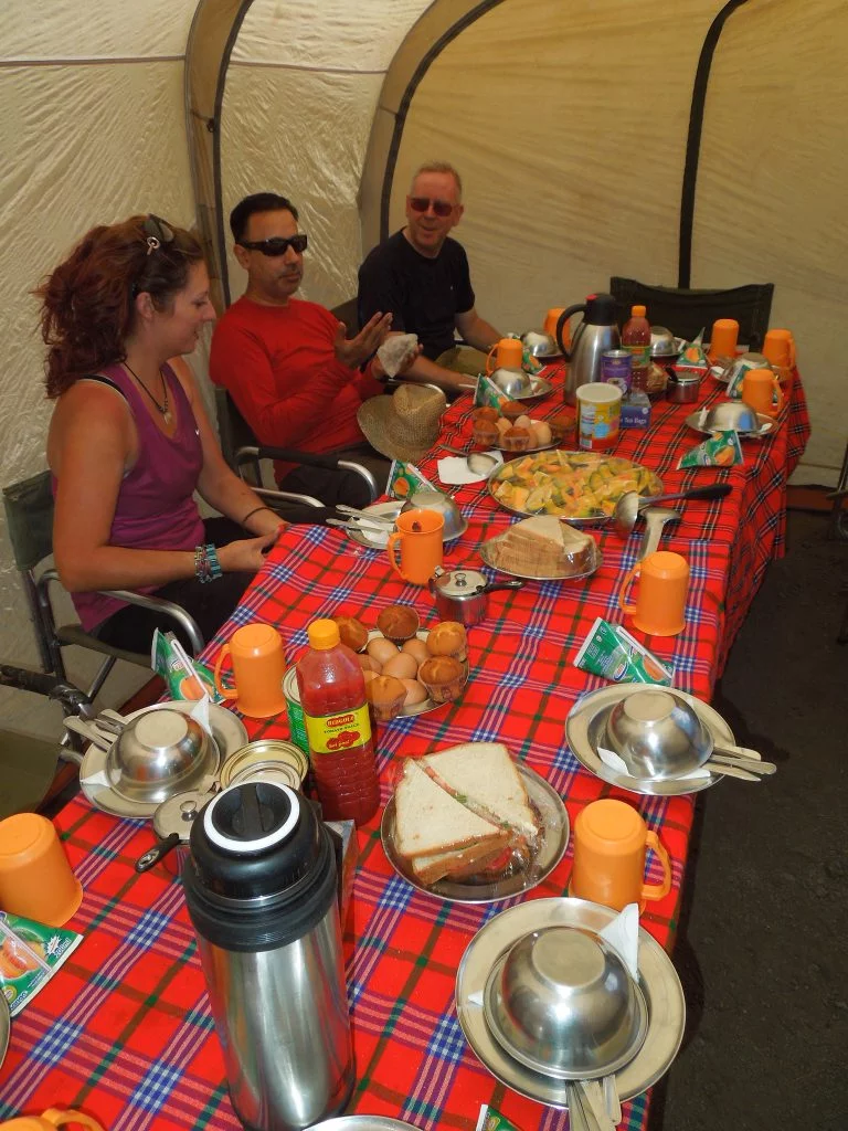 Mountain chef preparing food at camp