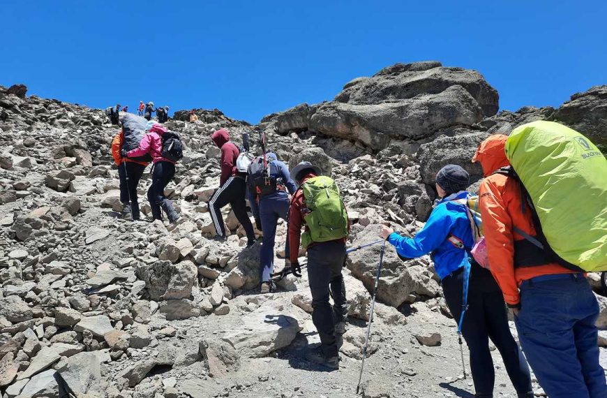 Kilimanjaro guide assisting climbers